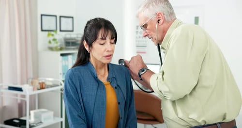 Stethoscope, woman and doctor in hospital, conversation and chest exam with healthcare
