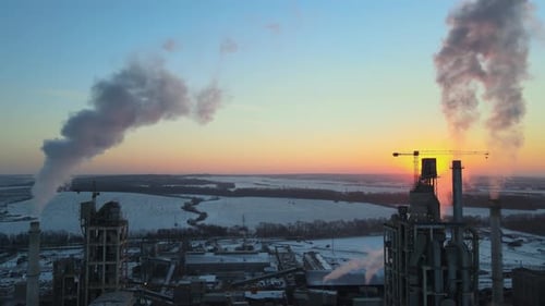 Aerial View of Cement Factory Tower with High Concrete Plant Structure at Industrial Production Area
