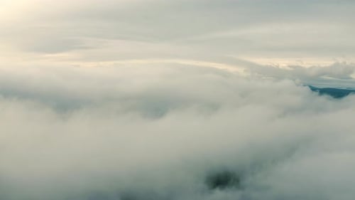 Clouds covering a mountain