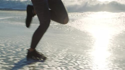 Legs running, fitness and beach waves for workout outdoor, marathon training motivation