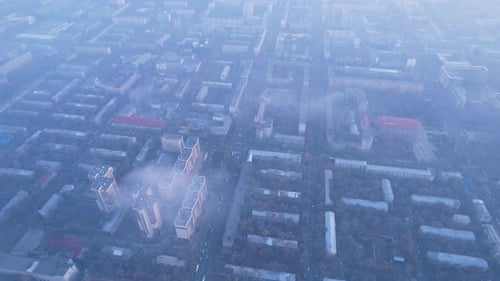 Epic Gray Smog is Visible at Sunset Over the City