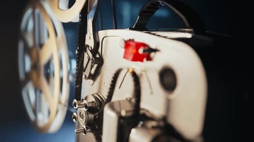 Vintage 8Mm Film Projector Rotating Reels Nostalgic Charm of Classic Cinema