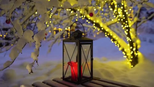 Christmas Lantern Glows in Snowy Winter Night
