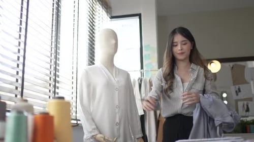 Designer make apparel at tailor workshop.