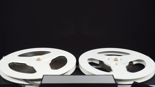Analog Reel to Reel Tape Deck Spinning