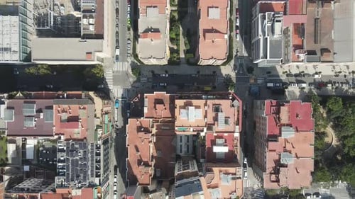 Aerial video above the buildings of the city of Barcelona, Europe