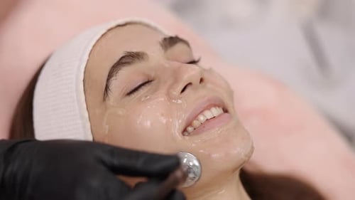 Young Adult Receiving a Facial Treatment