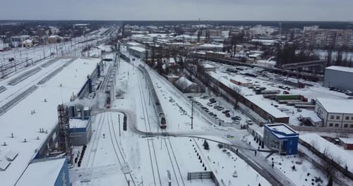 Aerial Shot of a Snowy Place with a Train