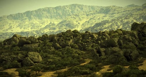 Scenic Mountain Landscape with Rocky Formations and Lush Greenery