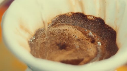 Pour Over Coffee Brewing in Ceramic Filter