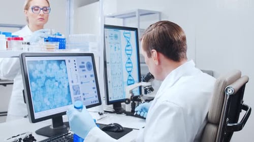 Scientists Working in Modern Medical Laboratory