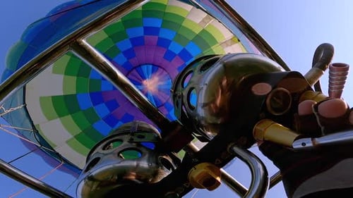 Low Angle of Hot Air Balloon with Flame