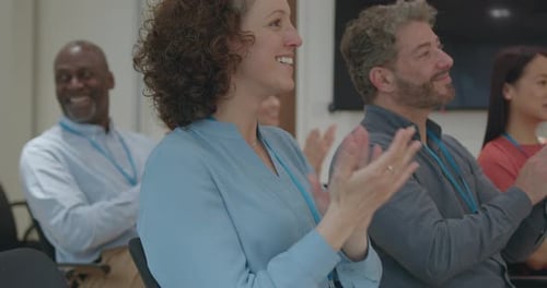 Business People at Conference Applauding