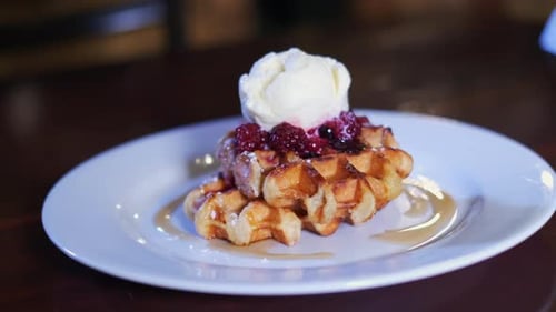 Waffle with Ice Cream and Berries on Plate