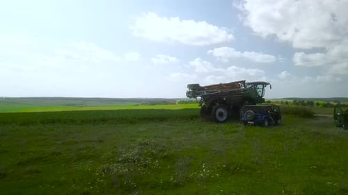 Spray Fertilize On Field With Chemicals In Agriculture Field