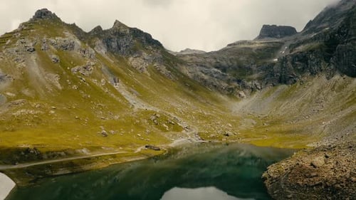 Magnificent High View At Alpine Mountain Range And Mountain Lake