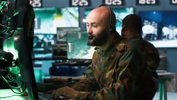 Soldier Solving Tasks in Military HQ Base Gathering Information on ...