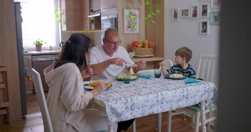 Family Mealtime in Cozy Kitchen