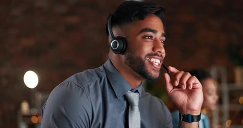 Call center, customer service and assistance with a man consultant working in an after hours support