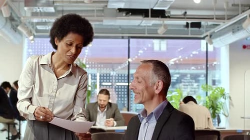 Team Working Together in a Modern Open Office