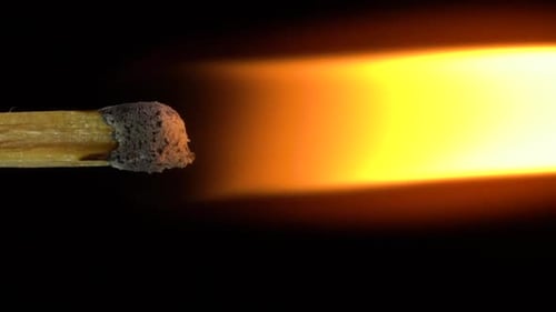 Burning Match Stick in Extreme Close Up