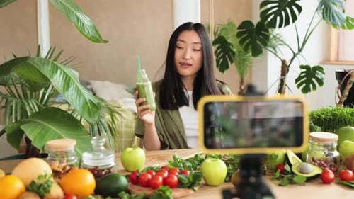 Woman Records Smoothie VLOG at Home