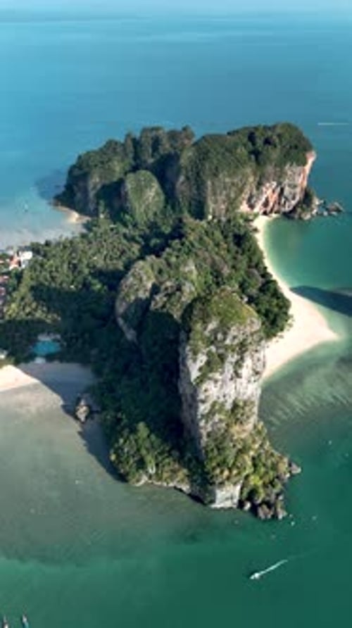 Explore the Stunning Beauty of Krabis Limestone Cliffs and Emerald Waters in Thailand