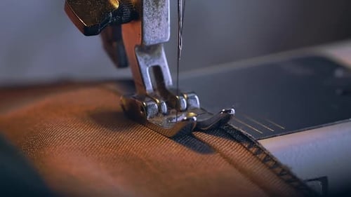 Close Up of Sewing Machine Stitching Fabric