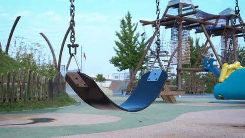 Empty Playground with Swings and Slides