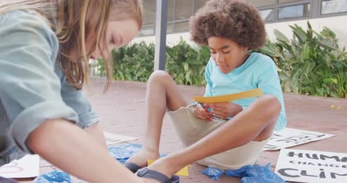 Children Making Environmental Protest Posters at School