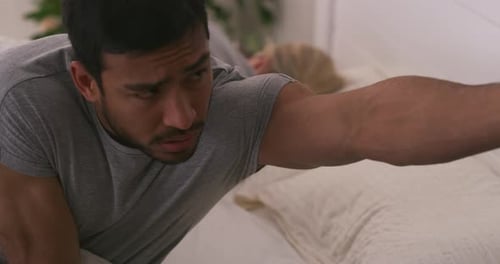 Man Wakes Up Upset in Bed