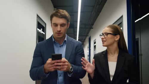 Businesswoman Mentor Talking Employee in Business Center