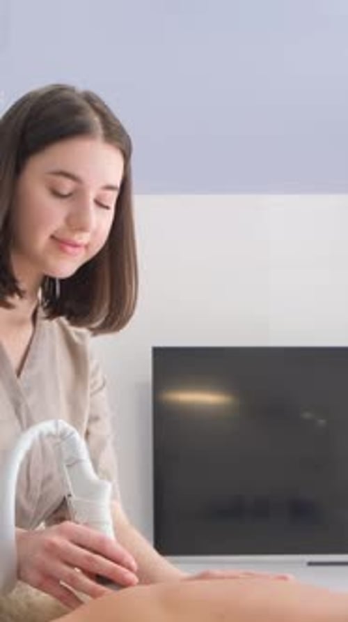 Vacuum Body Massage Young Woman in Beauty Salon Treatment of Cellulite Problem Areas in a Spa