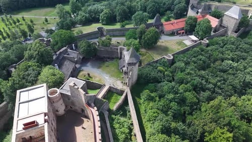 View Tower and Castle Helfstyn ruins, Cultural monument Tyn nad Becvou, Czechia. Aerial orbit