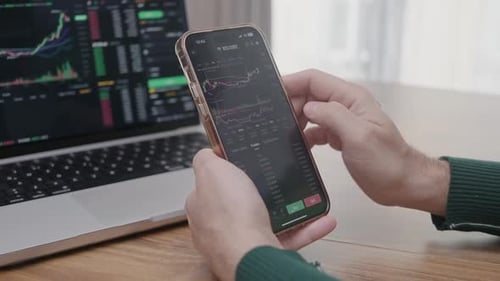 Investing on Stock Cryptocurrency Market Using Smartphone Trader Looking at Candle Chart