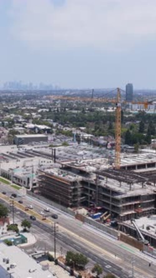 Extensive City Panorama Featuring Large Scale Construction Project with Prominent Crane Urban Growth