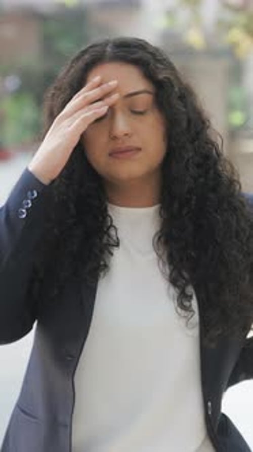 Woman Explaining with Hand Gestures Outside