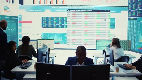 Busy Employees Work at Computers in Modern Office