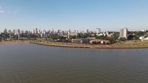 Aerial shot of coastal metropolitan city, city located near sea