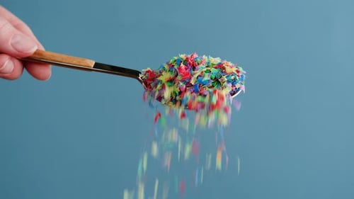 Microplastic Pollution Plastic Particles in Spoon Closeup Garbage and Trash Ecological Problems