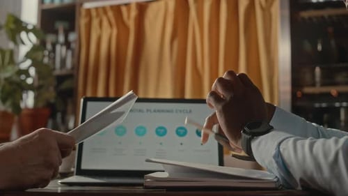 Business Deal Completed With Handshake at Workplace