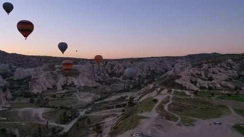 Hot Air Balloons Ascending in Cappadocia at Sunrise