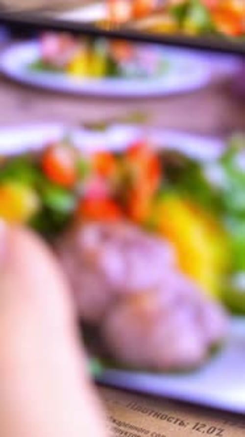 Delicious Salad with Meat, Fruit, and Fresh Greens