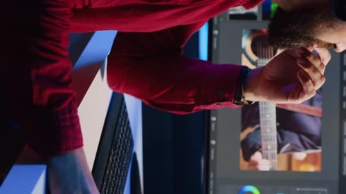 Vertical Video Videographer Operating Computer Editing Systems and Equipment
