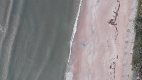 Aerial view of beach and ocean shore, United States.