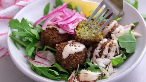 Close Up of Falafel Bowl With Greens