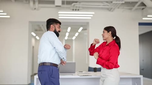 Office Workers Do Arm Workout Routine at Workplace