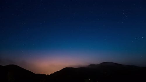 Night Sky Time Lapse Over Mountain Landscape
