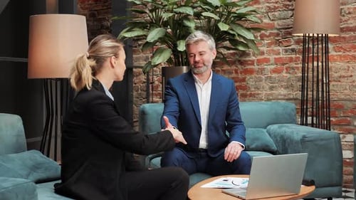 Confident Caucasian Male Financial Advisor Bank Worker Broker Shaking Hands