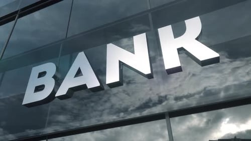 Bank Sign on Glass Building